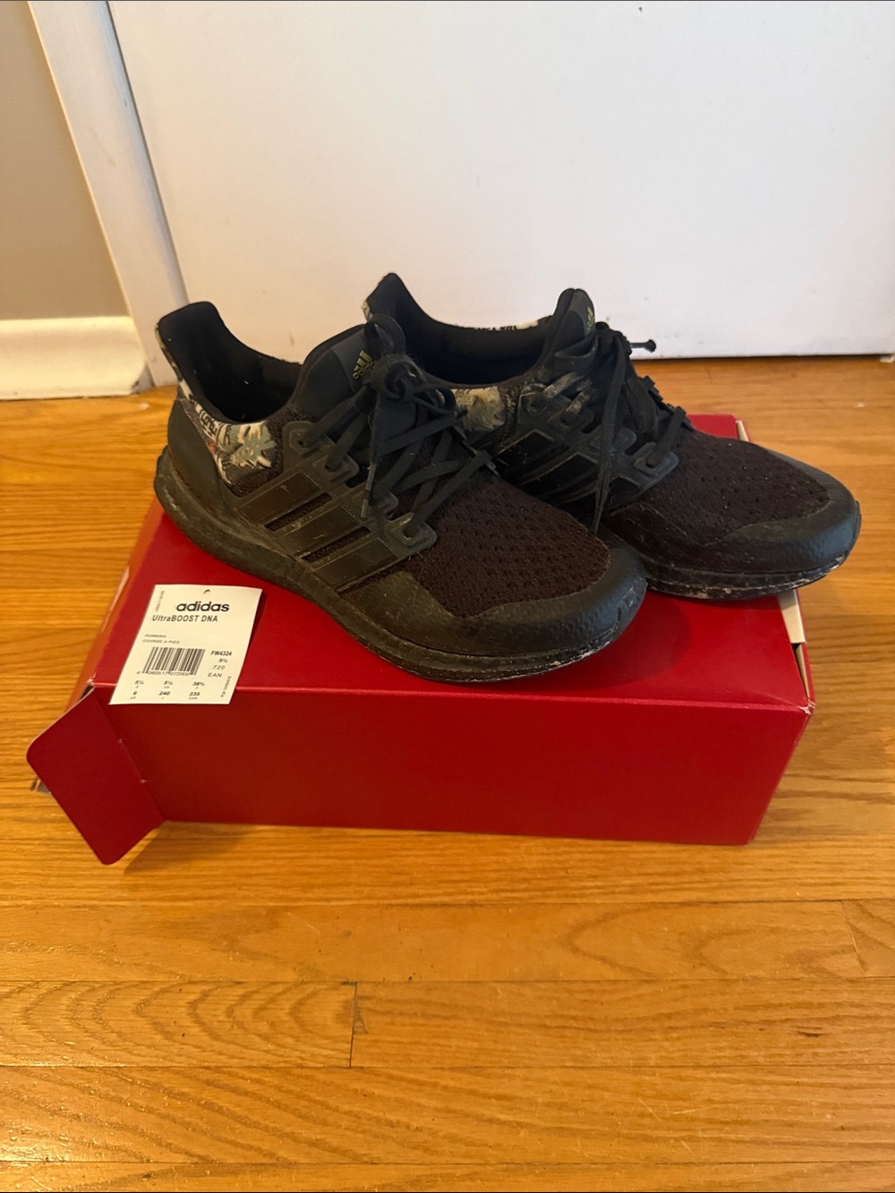 adidas Black Athletic Running Shoes with Camouflage Heel Accents